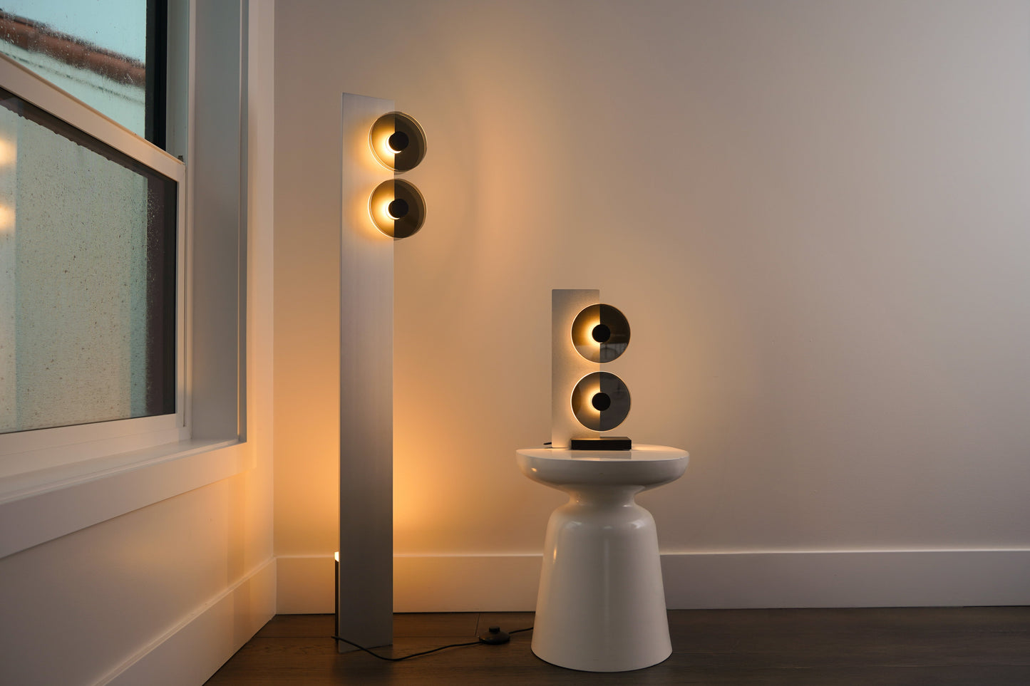 Modern floor lamp and table lamp in a room setting