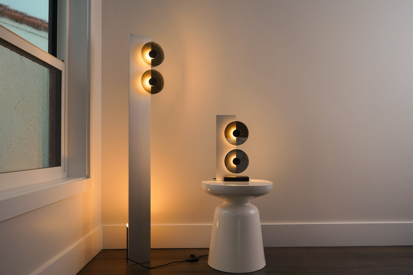 Modern floor lamp and table lamp in a room setting